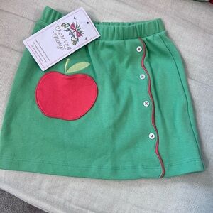 Charming Mary Green Skirt with Red Apple Design